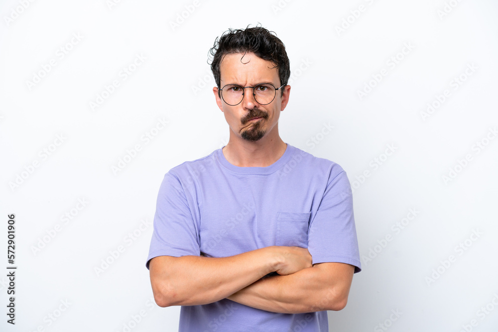 Young man with moustache isolated on white background with unhappy expression Young man with moustache isolated on white background with unhappy expression