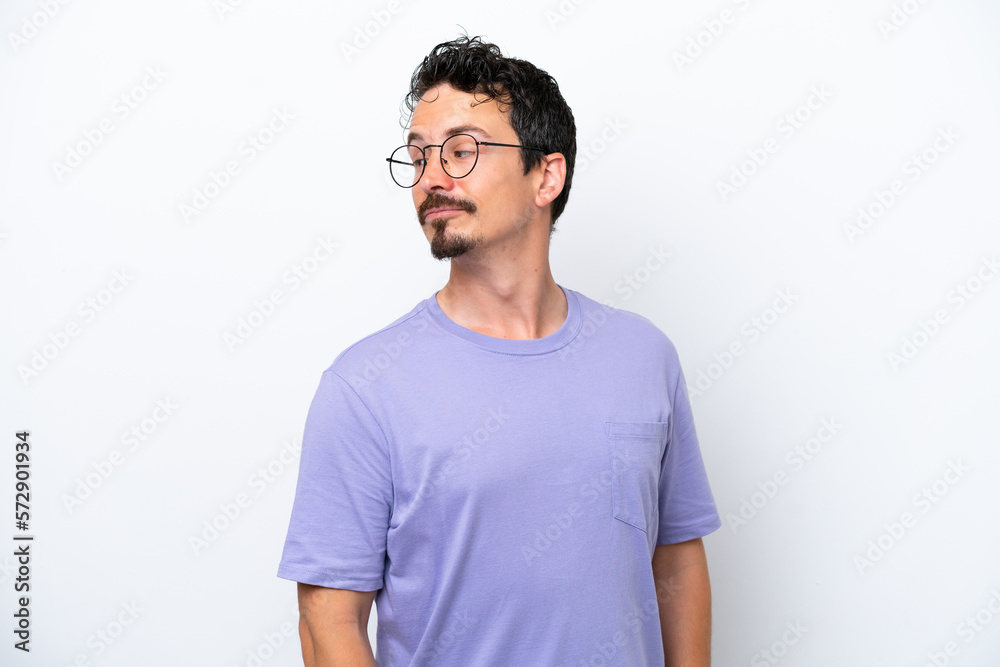 Fototapeta premium Young man with moustache isolated on white background . Portrait