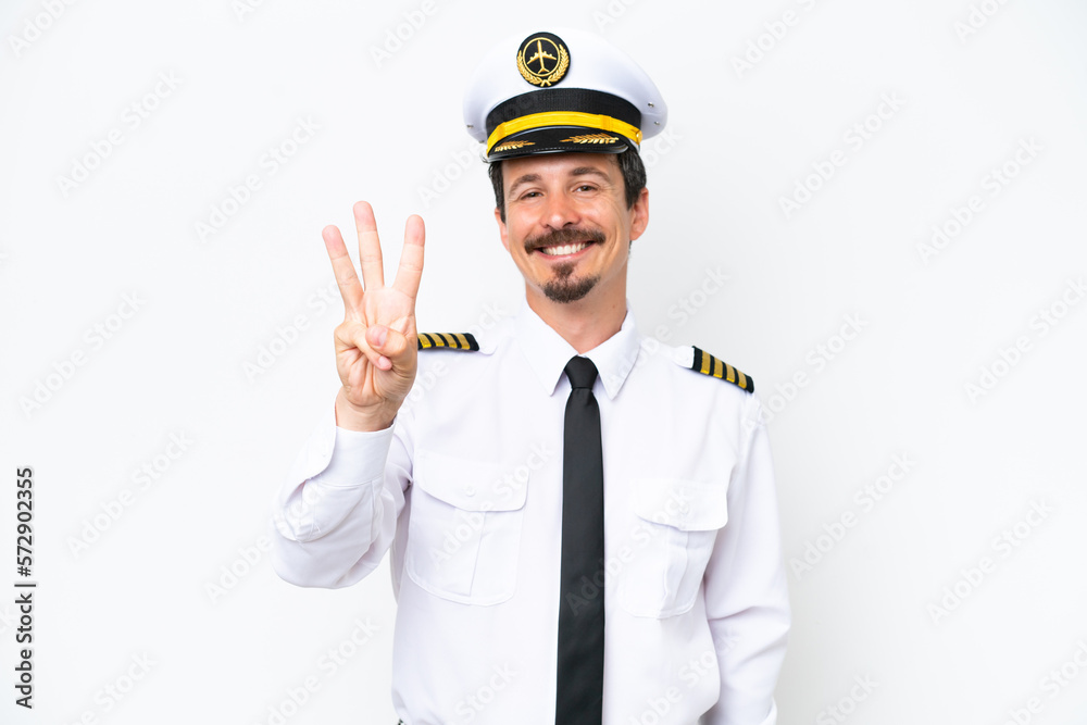 Airplane caucasian pilot isolated on white background happy and counting three with fingers Airplane caucasian pilot isolated on white background happy and counting three with fingers