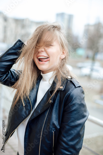girl with blond hair smiling