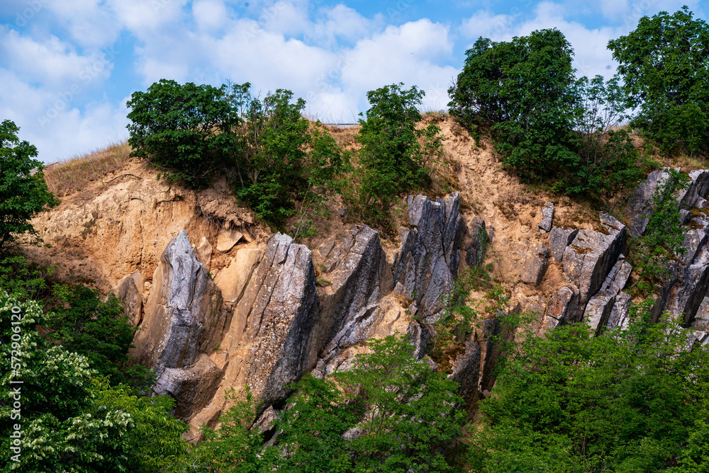 Amazing geologichal park with cliffs and lookout tower in aerial view. This is in Baranya count south Hungary. This place it was a stone mine in the past.