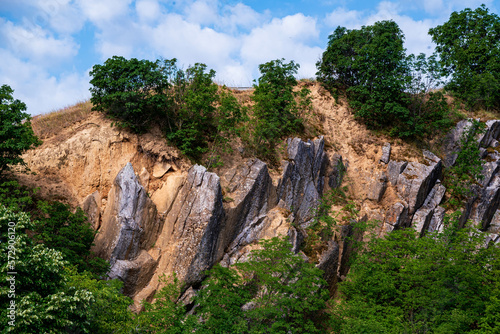 Amazing geologichal park with cliffs and lookout tower in aerial view. This is in Baranya count south Hungary. This place it was a stone mine in the past.