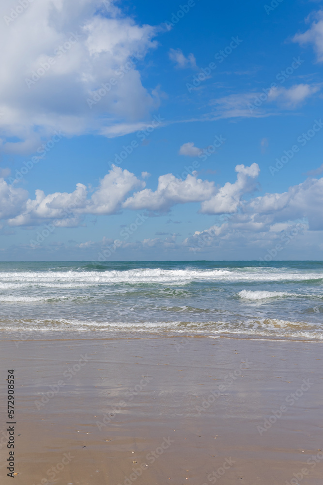 tropical background for travel site. sea ​​and beach with beautiful clouds.