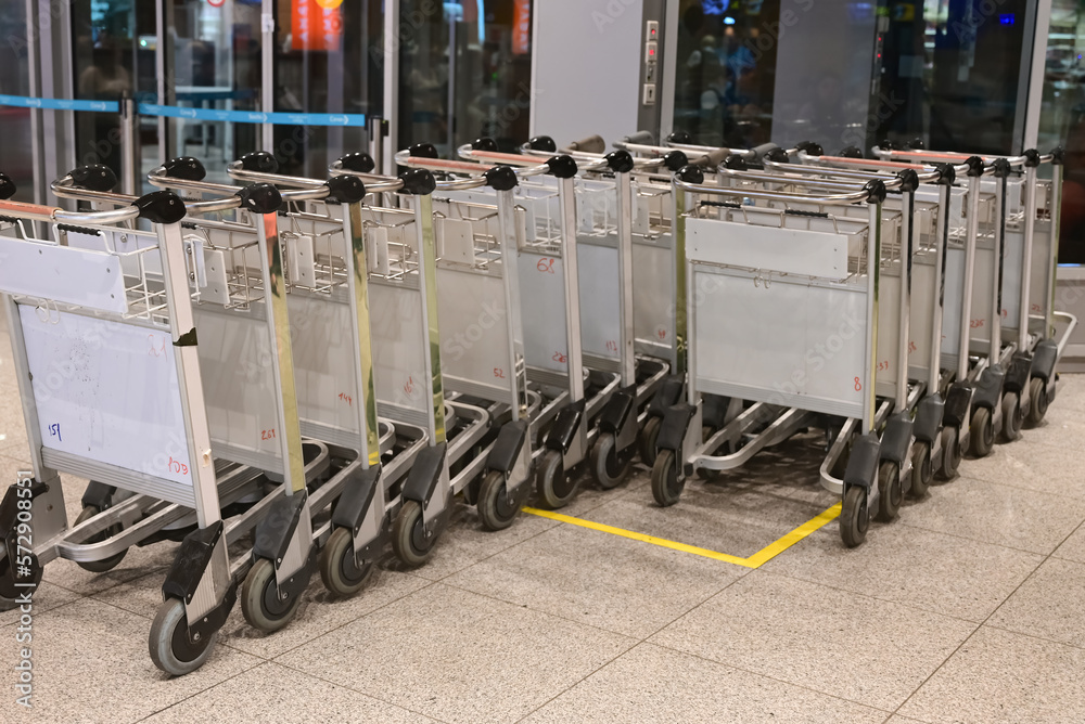Close up group of empty airport carts baggage carts, luggage carts