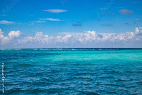 background of turquoise sea and blue sky