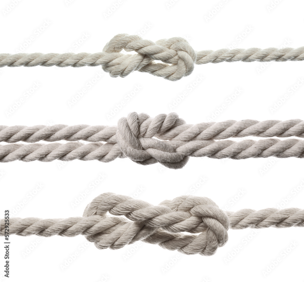 Set of cotton ropes with knots on white background, closeup