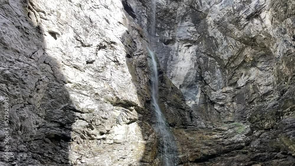 Switzerland canyon in Grindelwald. Big grey boulders and rocks. River in the huge canyon. Waterfall from the rocks. Summer sunny hiking day. Natural landscapes in Switzerland canyon and forest.
Switzerland canyon in Grindelwald. Big grey boulders and rocks. River in the huge canyon. Waterfall from the rocks. Summer sunny hiking day. Natural landscapes in Switzerland canyon and forest.