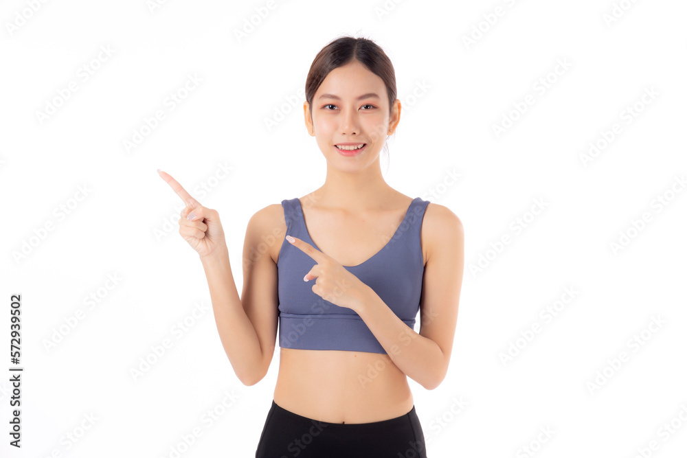 Portrait of beautiful young asian woman in sportwear smile and presenting isolated on white background, sport and exercise for health and weightloss, female and slimming showing something. Portrait of beautiful young asian woman in sportwear smile and presenting isolated on white background, sport and exercise for health and weightloss, female and slimming showing something.