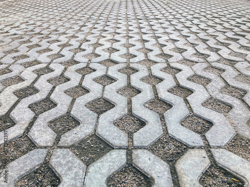 Grass eco pavement of parking lot. New concrete paving texture seamless photo