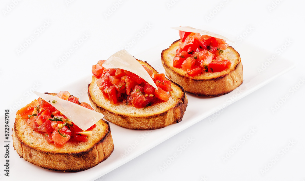 Traditional italian antipasto bruschetta appetizer with cherry tomatoes Traditional italian antipasto bruschetta appetizer with cherry tomatoes