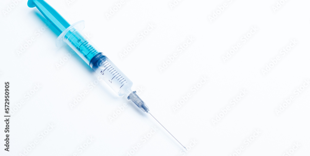Disposable plastic syringe prepared for injection and vaccination in the hospital. The concept of medicine and health Disposable plastic syringe prepared for injection and vaccination in the hospital. The concept of medicine and health