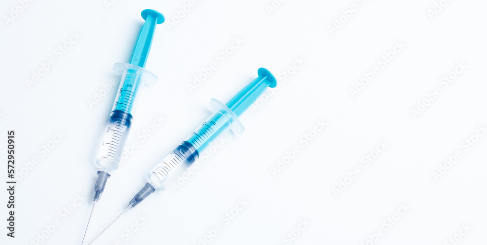 Disposable plastic syringe prepared for injection and vaccination in the hospital. The concept of medicine and health Disposable plastic syringe prepared for injection and vaccination in the hospital. The concept of medicine and health