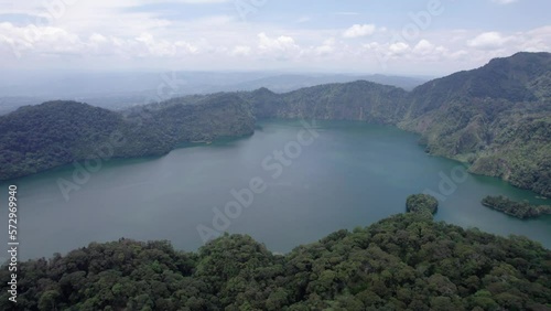 Ngozi lake in Mbeya, Tanzania. Drone view to second largest crater lake in Africa. Beautiful landscape surrounded by a bowl of high mountains. photo