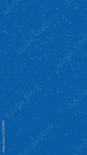 Small bubbles rising in blue liquid or drink. Abstract CG bubble animation background. Seamless loopable vertical background. photo