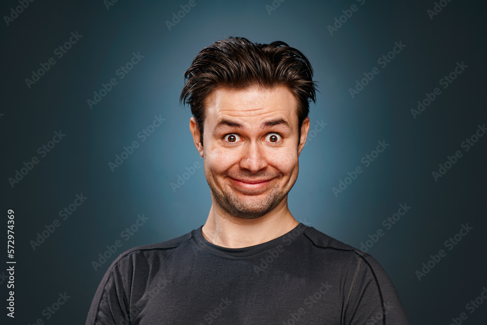 Young man silly smiling portrait Young man silly smiling portrait