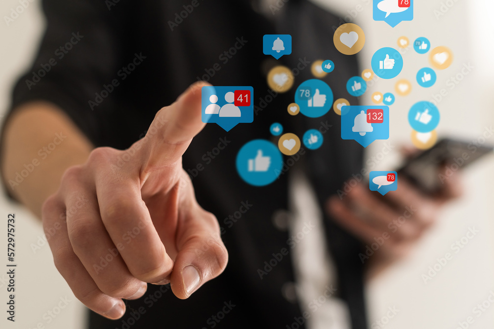 Businessman pressing modern social buttons on a virtual background Businessman pressing modern social buttons on a virtual background