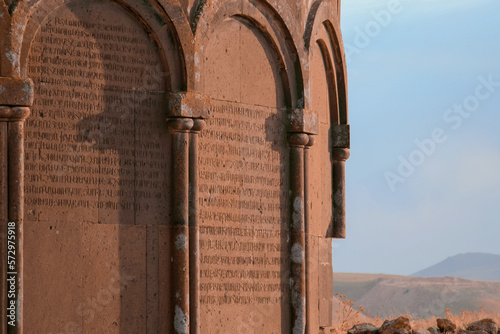 Ani site historical cities (Ani Harabeleri): first entry into Anatolia, an important trade route Silk Road in the Middle Agesand. Historical Church and temple at sunset in Ani, Kars, Turkey. photo