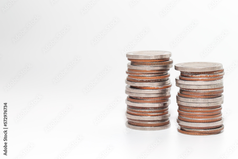 Coin on white background, stacked coins Coin on white background, stacked coins