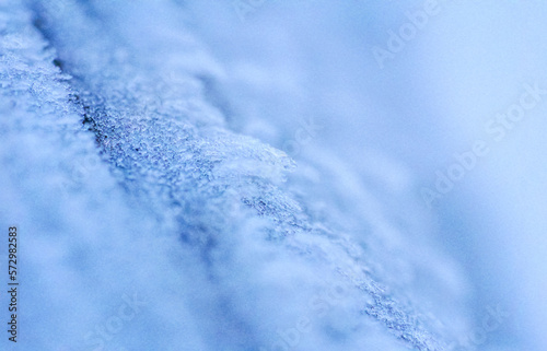 Crystals of ice frozen on beam due to strong wind