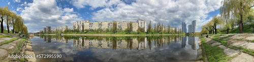 Panorama of the city over the river. Beautiful summer view of the standard development of Rusanovsky Island. Kiev Ukraine 2022-06-06 photo