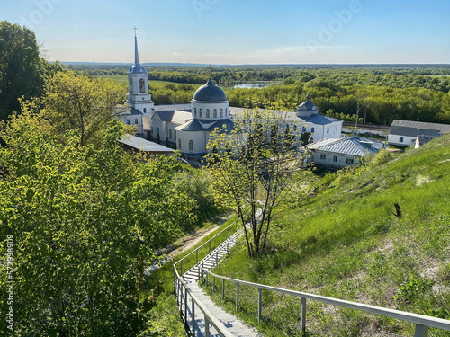 Panorama of summer landscape with ortadox chirch with clear sky view from mountain photo