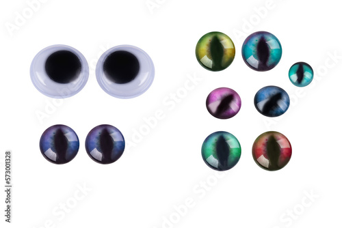 collection of various googly eyes plastic isolated on white background photo