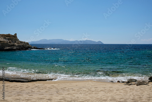 Fototapeta Naklejka Na Ścianę i Meble -  The beautiful turquoise sandy beach of Sapounohoma in Ios Greece