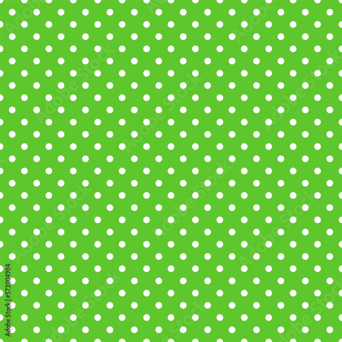 Seamless pattern in retro style.Abstract vintage pattern with small white polka dots on a green background for textiles, wrapping paper, banners, print, packaging and other design. Vector illustration