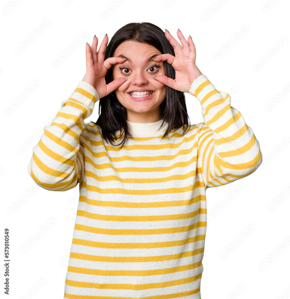 Young caucasian woman isolated keeping eyes opened to find a success opportunity. Young caucasian woman isolated keeping eyes opened to find a success opportunity.