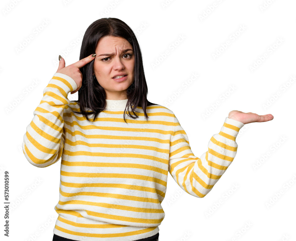 Young caucasian woman isolated holding and showing a product on hand. Young caucasian woman isolated holding and showing a product on hand.