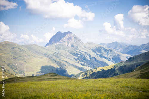 mountain peaks in the distance and valley in front