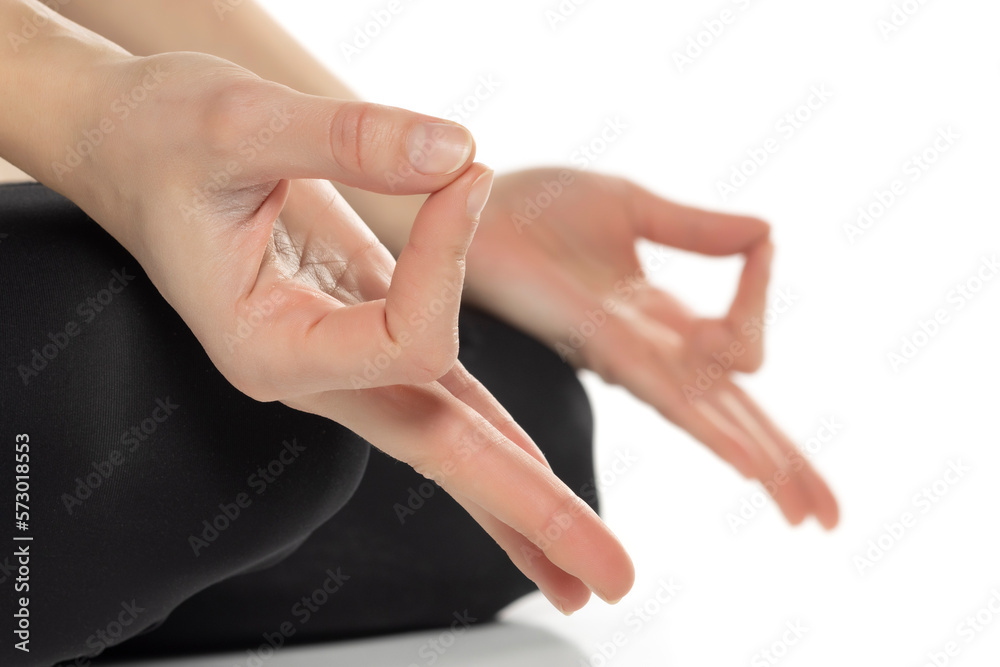 Close up hands. Woman do yoga relax on white background. Healthy and Yoga Concept