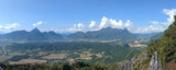Panoramic View from Mountain at Vang Vieng Laos. Nature Sky Cloud Sun. Amazing tourist top spot. Mountain at Vang Vieng Laos. Amazing tourist top spot, Hike through forest and mountain. High quality