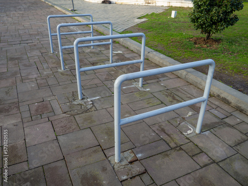 Bicycle parking place. Metal railings for securing bicycles on the street.