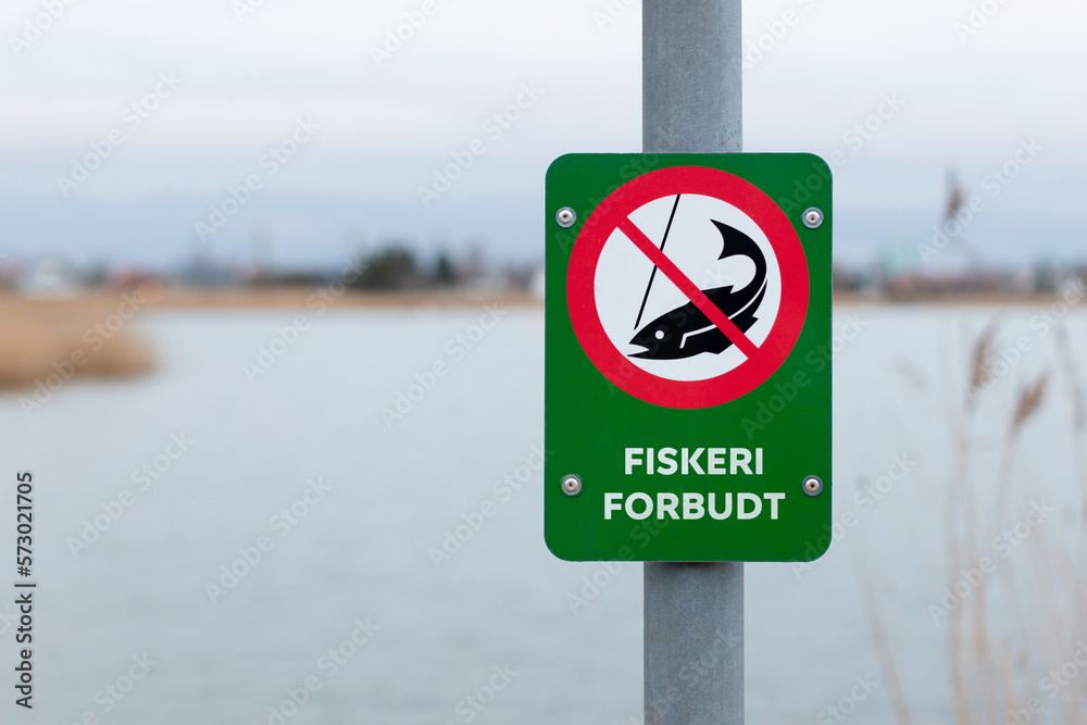 Danish fishing prohibited sign near lake - NO FISHING Danish fishing prohibited sign near lake - NO FISHING