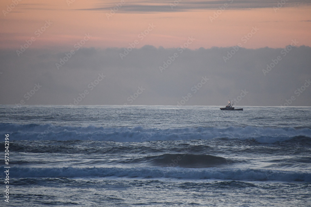 Fototapeta premium commercial fishing ship just off the coast