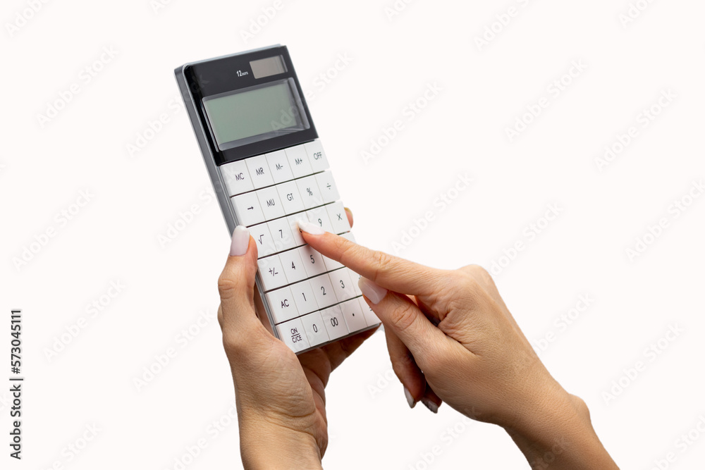 Woman hand hold a calculator isolated on white. Woman hand hold a calculator isolated on white.