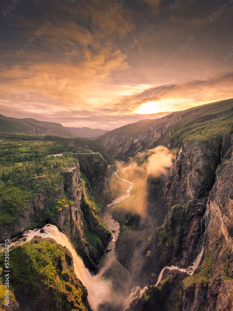 Amazing sunset over the  Voringfossen waterfalls in Norway
