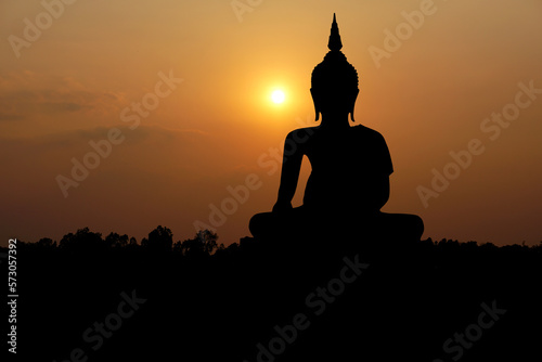 big buddha silhouette sunset background.Makha Bucha Day.Vesak Day.Asanha Bucha.Buddhist Lent. © buraratn