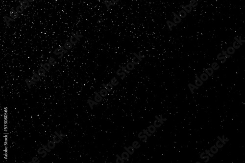 Abstract black background with sparkles and shadows. Fluidity  waves  glitter  fluid  glitter  shimmer. Stars  stardust  space  outer space  comets  placer.
