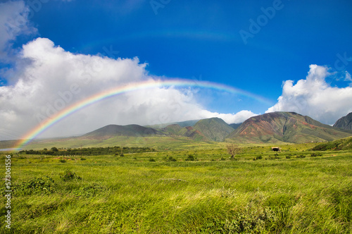 Extreme wide angle rainbow over the west maui mountains.