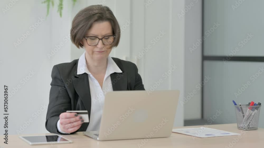 Old Businesswoman Unable to make Online Payment on Laptop Old Businesswoman Unable to make Online Payment on Laptop