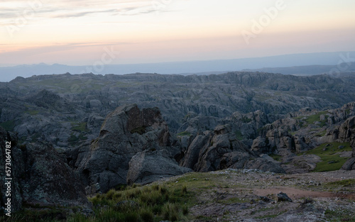 Fototapeta Naklejka Na Ścianę i Meble -  Magical view of the rock massif Los Gigantes in Cordoba Argentina. View of the rocky hills with beautiful texture and pattern, at sunset.