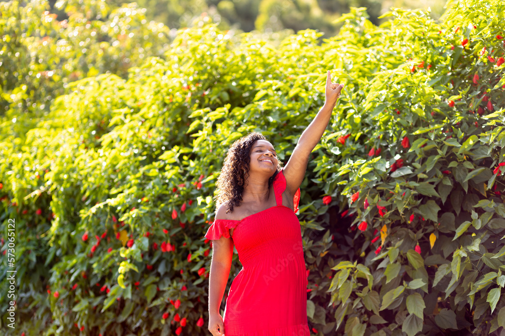 Black woman happy and having fun while walking outdoors Black woman happy and having fun while walking outdoors