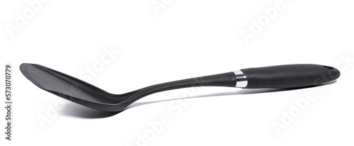 Plastic black spatula for cooking on a white isolated background