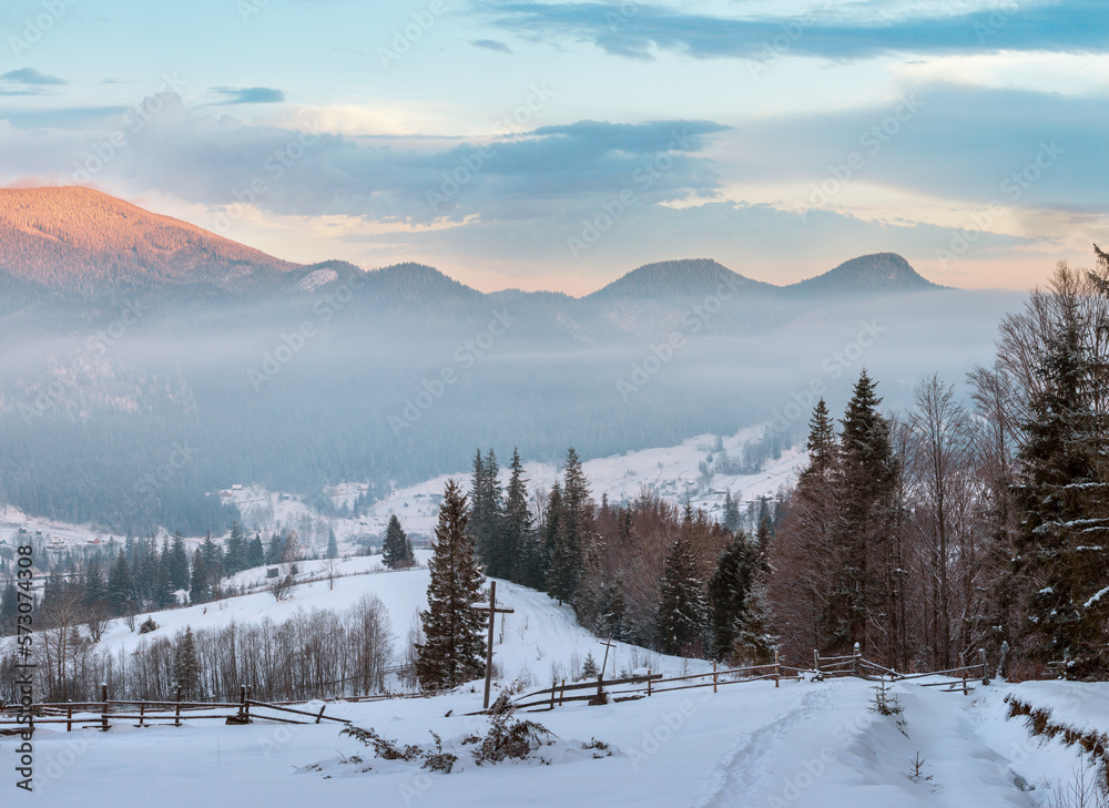 Sunrise winter Carpathian mountain village, Ukraine