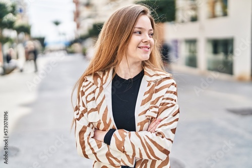 Young caucasian woman at street