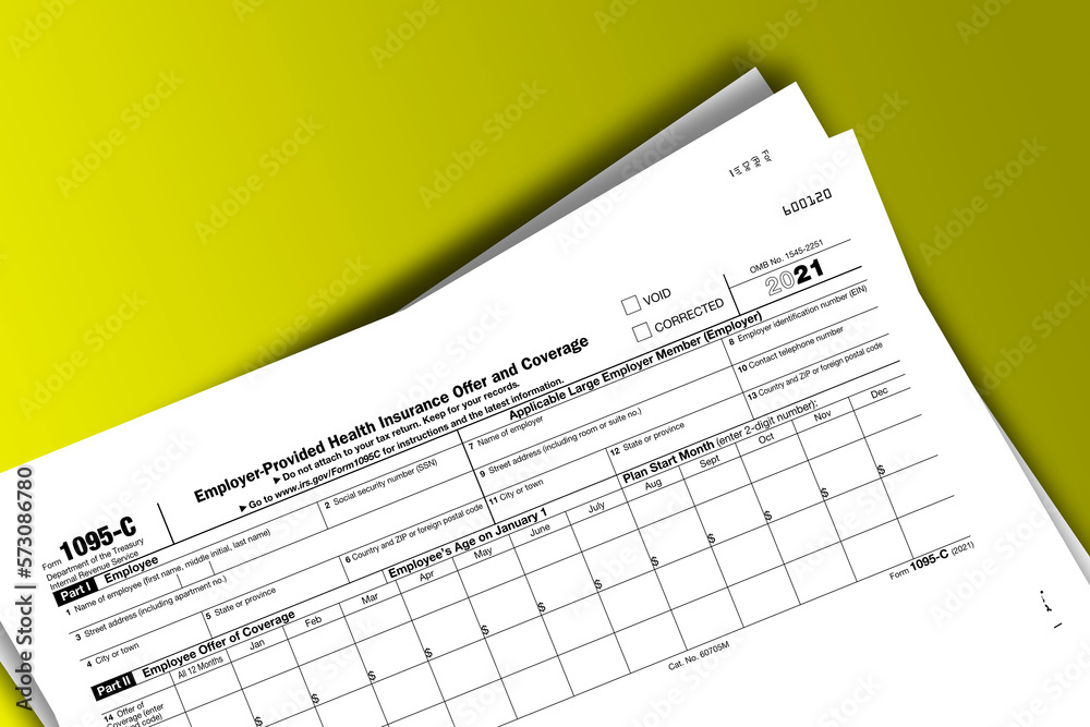 Form 1095-C documentation published IRS USA 10.27.2021. American tax document on colored Form 1095-C documentation published IRS USA 10.27.2021. American tax document on colored