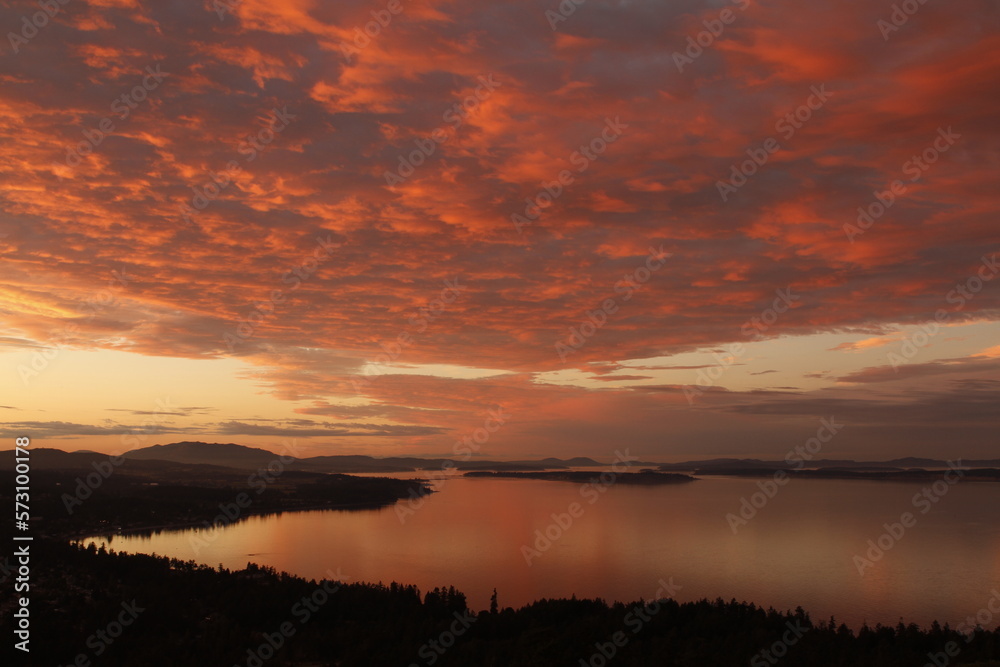 Sunset with dramatic clouds over Cordova Bay, Vancouver Island, BC