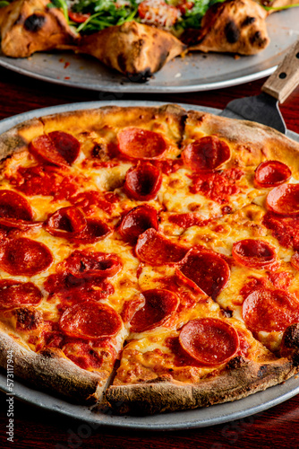 Pizza. Cheese Pizza. Traditional New York City style margarita pizza pie with a thin homemade crispy crust, tomato, garlic, marinara sauce topped with buffalo mozzarella cheese and fresh basil leaves.